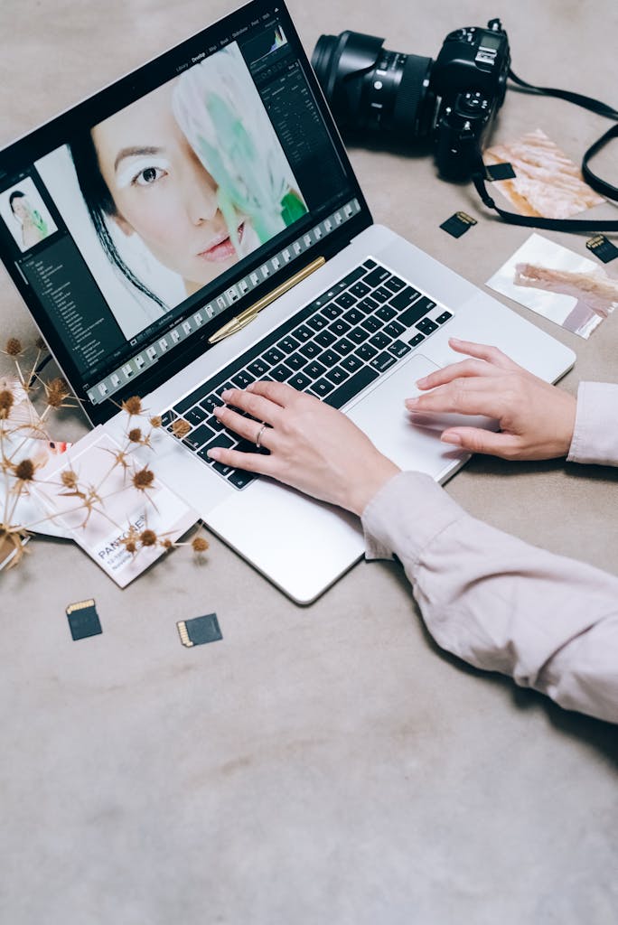 A Person Typing on Laptop