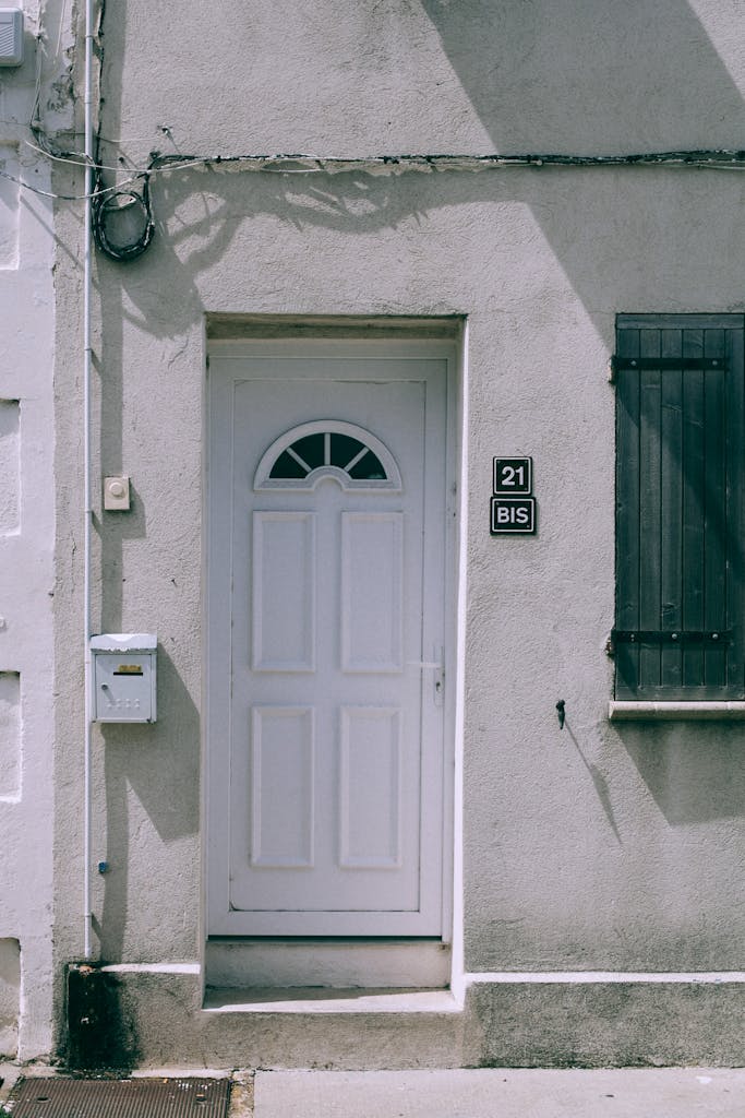 Facade of old house with entrance door